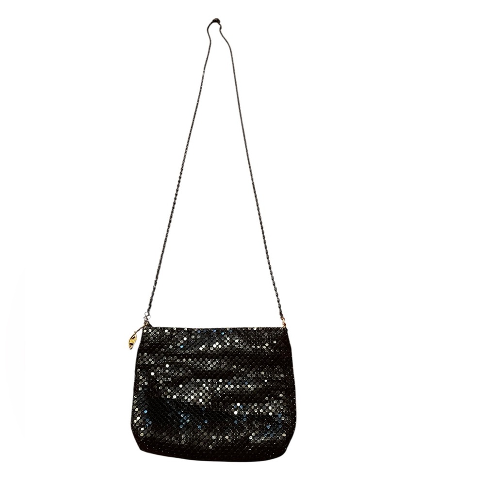 Black metal‎ mesh evening bag with chain link strap.